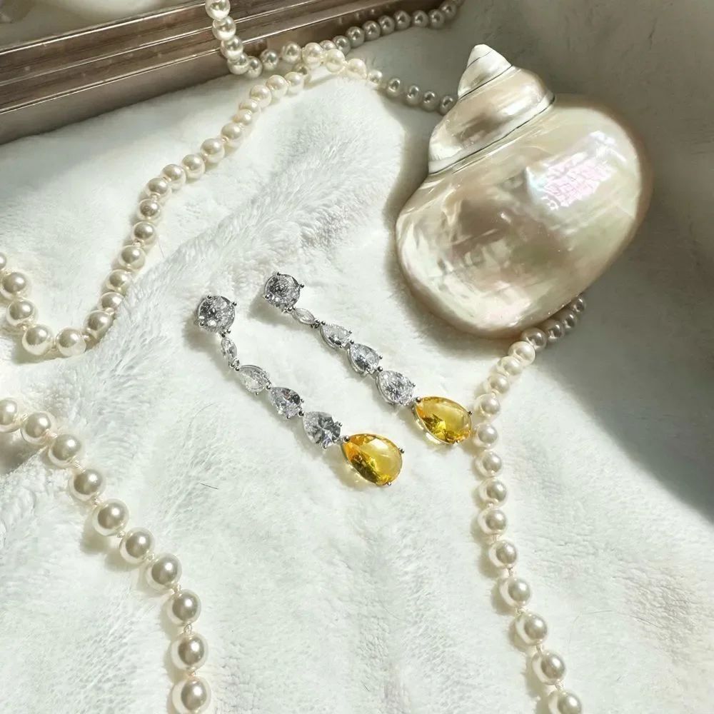 Canary pear cut cubic zirconia tear drop earrings - 2 inches long